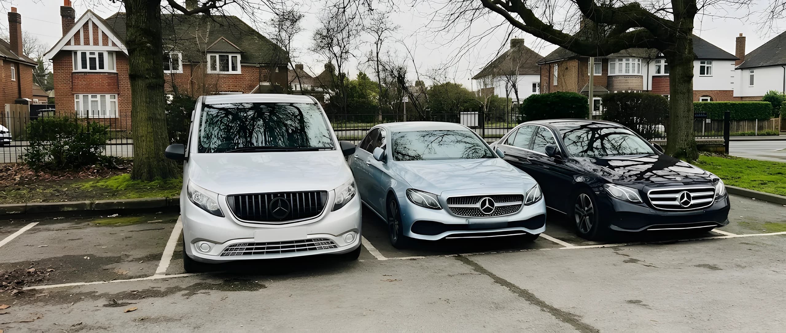 Three Mercedes executive cars parked side by side: a people carrier and two saloons